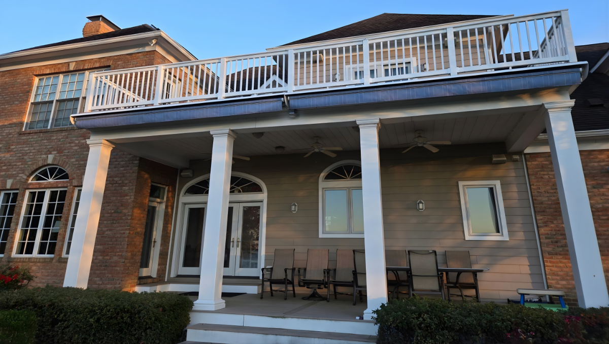 Retractable awning closed on waterfront home patio deck in Maryland Delaware showing compact housing when shade is not needed