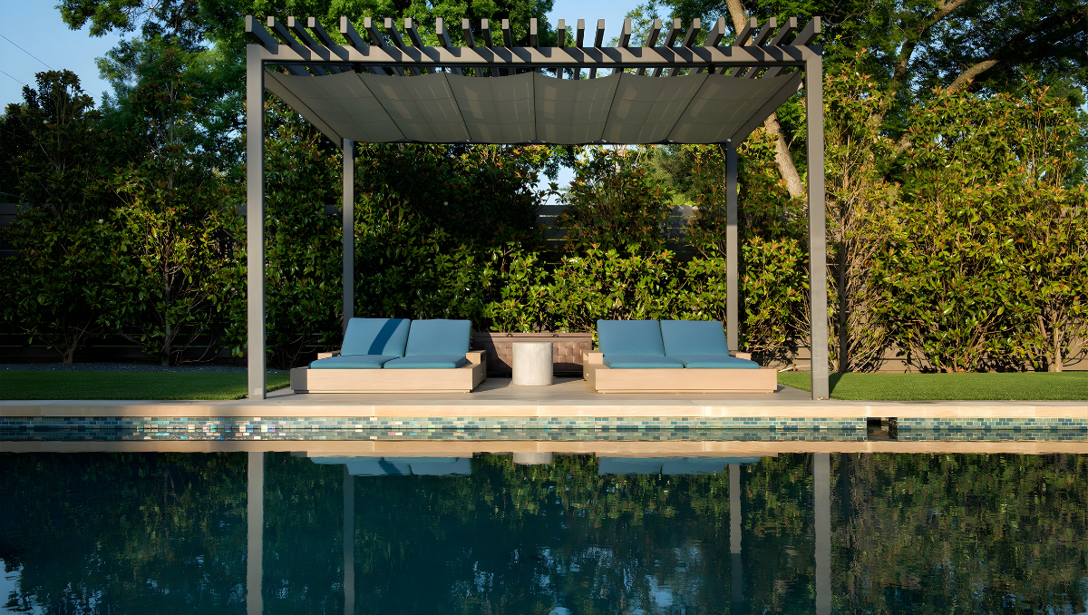 Retractable pergola outdoor shade structure installed at a backyard pool patio in Royal Oak, Maryland on the Eastern Shore.