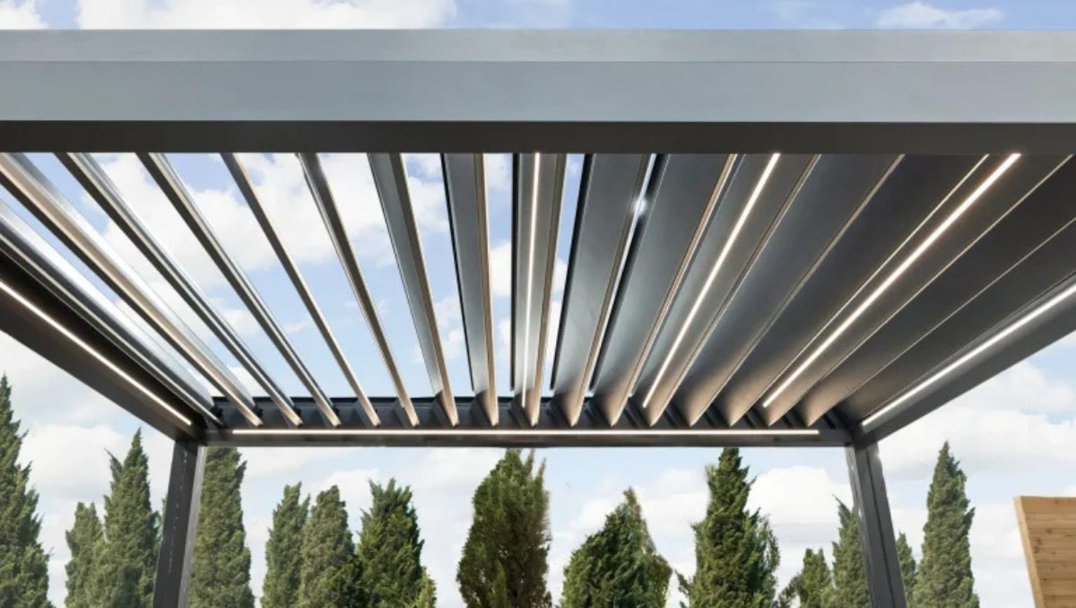 Close-up of motorized louvered pergola roof with adjustable slats and integrated LED lighting