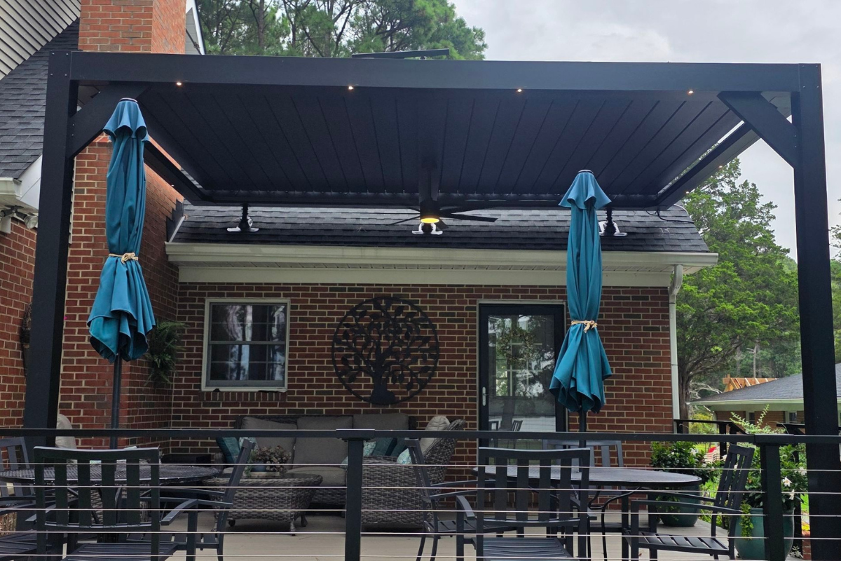 Completed Motorized Pergola with Lights Completed motorized louvered pergola with integrated lights over a furnished deck in Royal Oak